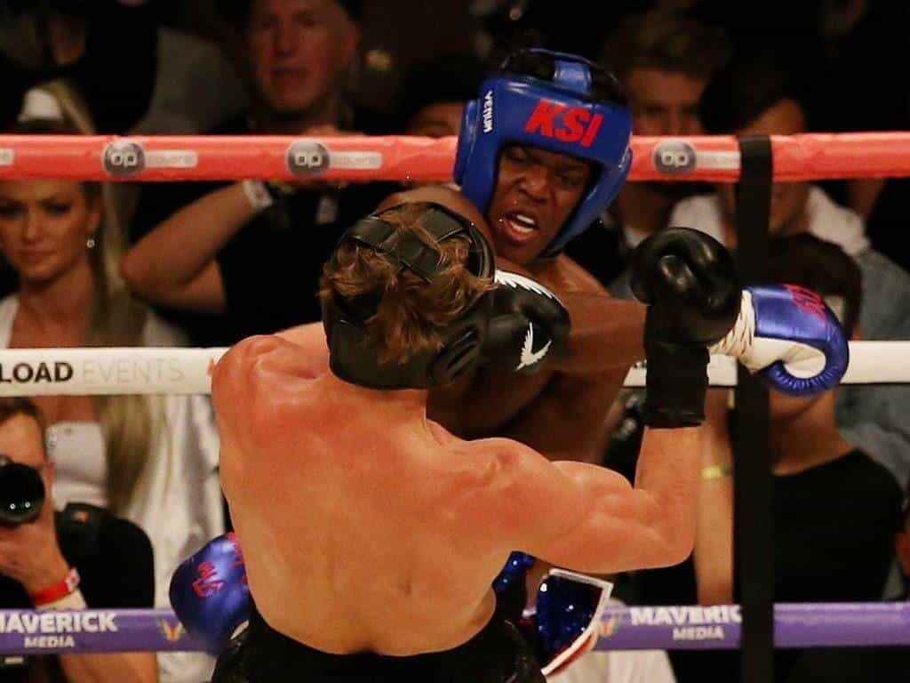 YouTuber KSI hits Logan Paul in the head. 