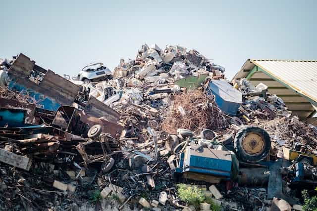 Piles of trash at a dump.